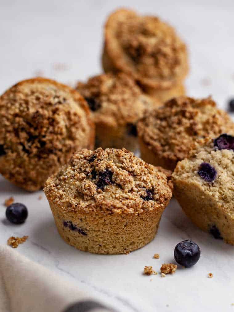 half a dozen Vegan low Fodmap blueberry muffins on a table