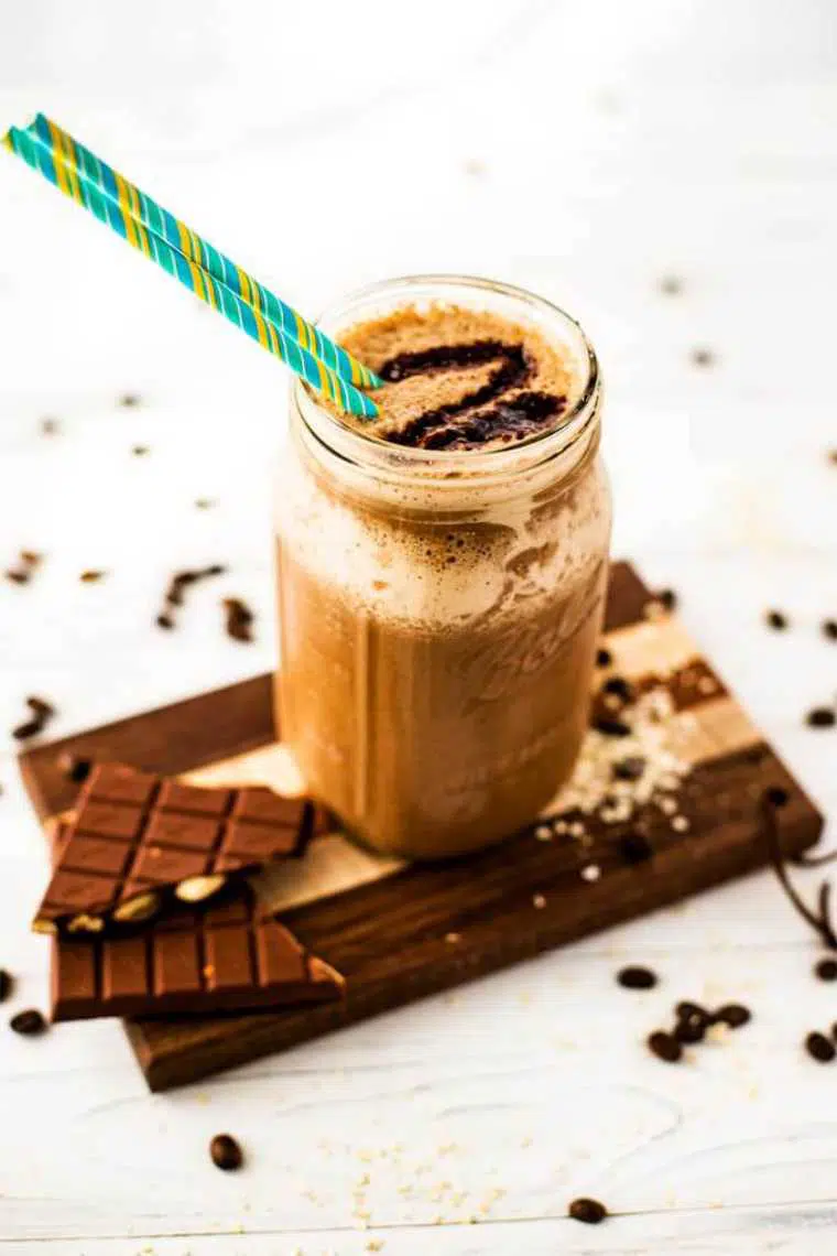 mason jar with coffee and chocolate infused quinoa smoothie