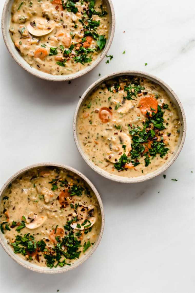three bowls with creamy Instant Pot wild rice soup