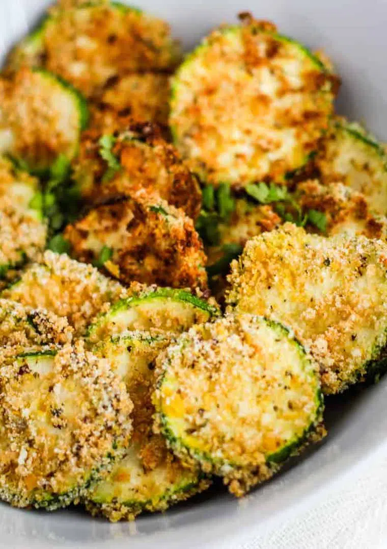 white bowl with healthy homemade air fryer zucchini chips