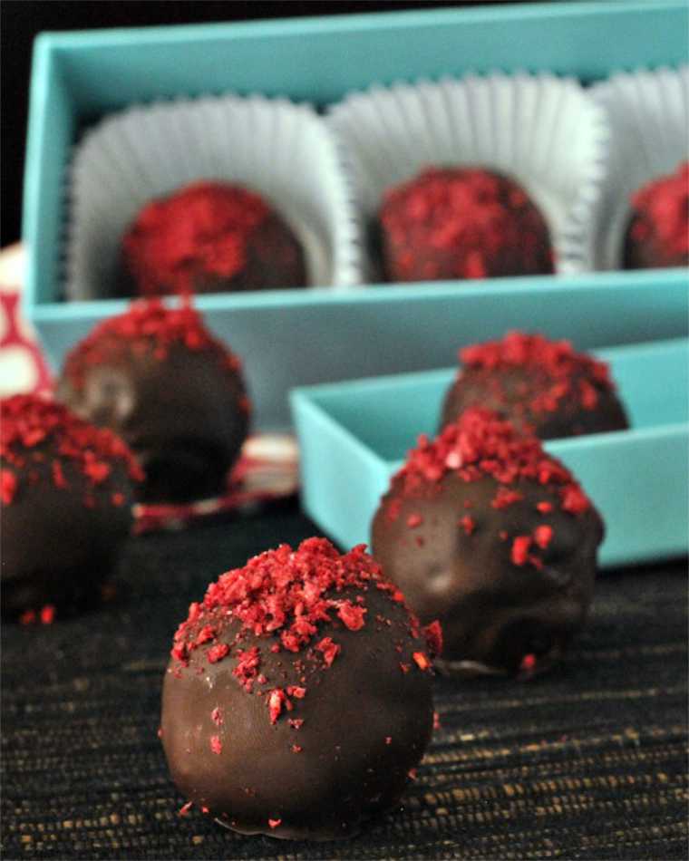 bright blue gift box with homemade Raspberry Chocolate Fudge Brownie Truffles