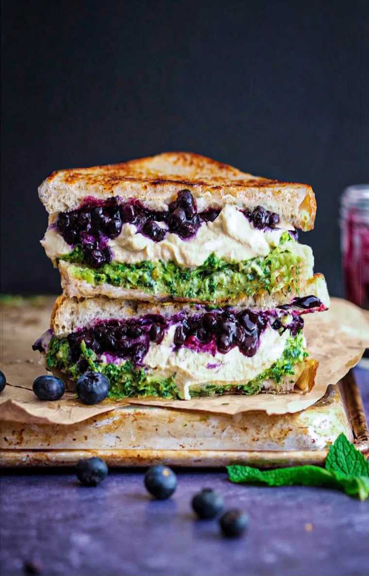 two blueberry grilled vegan cheese sandwiches with mint pesto
