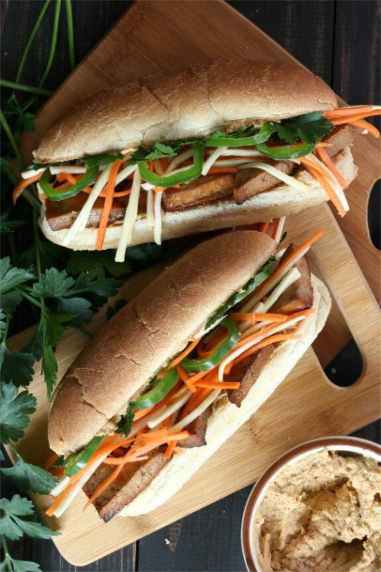 wooden cutting boards with two Vegan Banh Mi Sandwiches