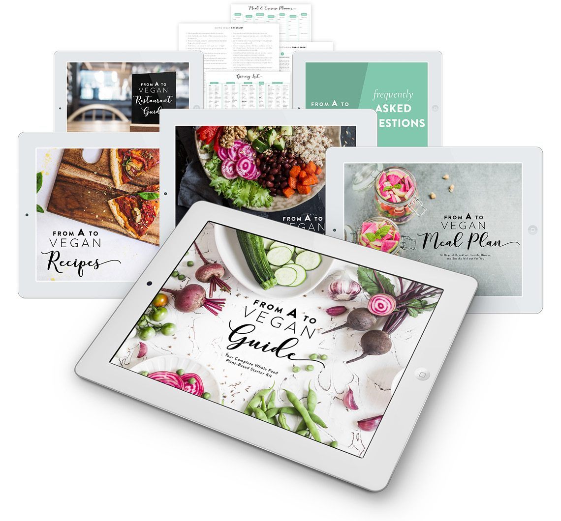 Six iPads and several cheat sheets showcasing the entire Vegan Starter Kit
