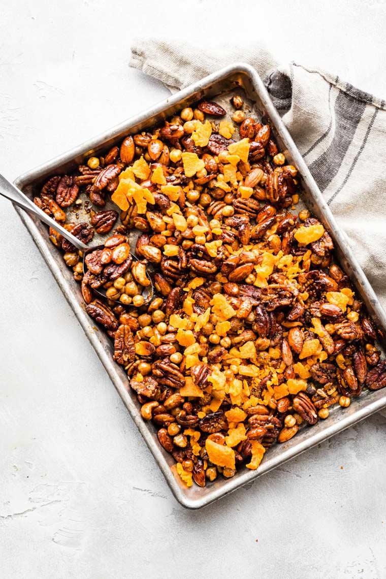 baking dish with some roasted pecans, almonds, chickpeas and more nuts