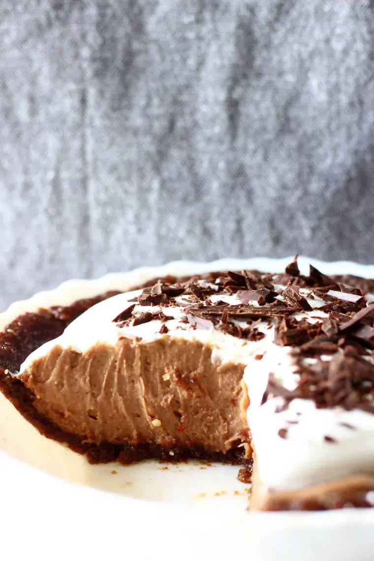 pie form with no-bake crust and creamy vegan chocolate filling