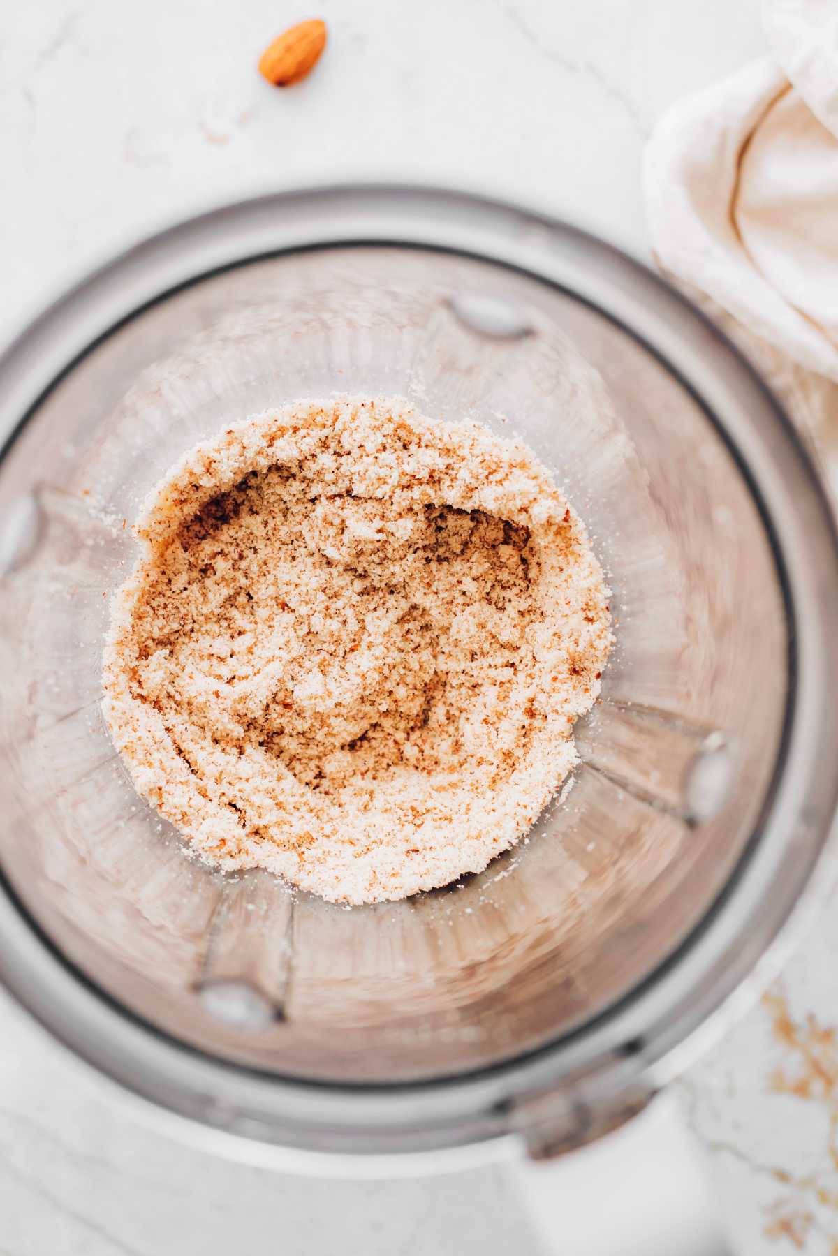 darker almond flour in a blender jar