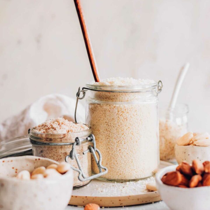 almond flour in different jars on a table