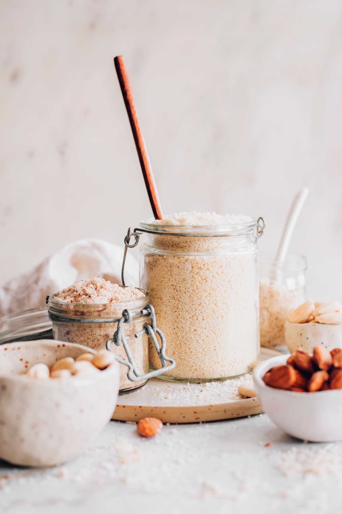 almond flour in different jars on a table