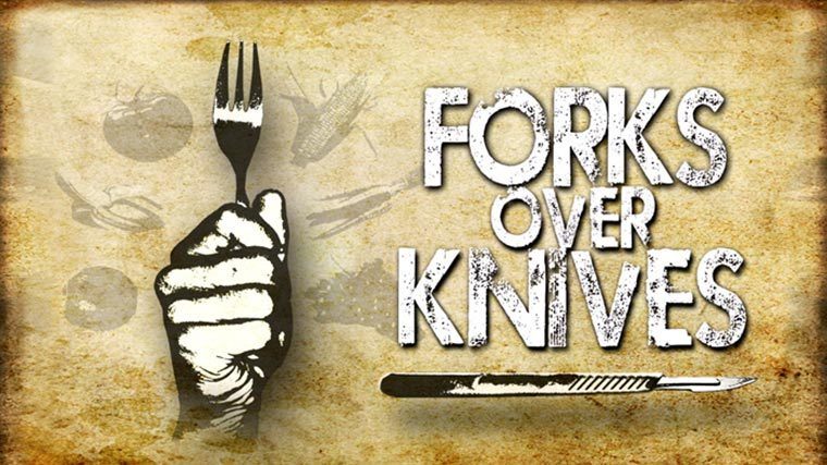 Text saying Forks Over Knives next to a drawn hand clenching a fork on a parchment-like background