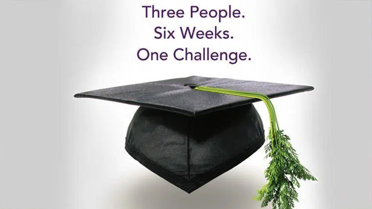 Black academic hat with carrot greens attached to the center and the text Three People. Six Weeks. One Challenge. above it