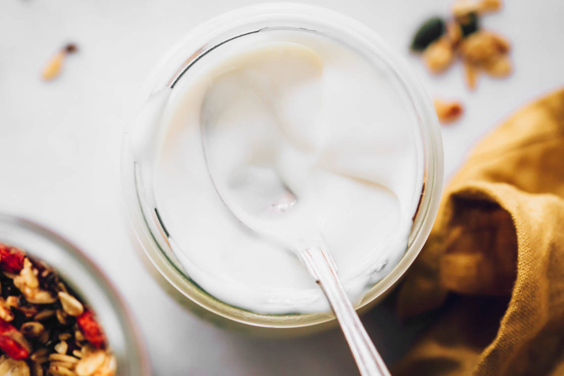 glass of dairy free yogurt as a substitute to dairy yogurt