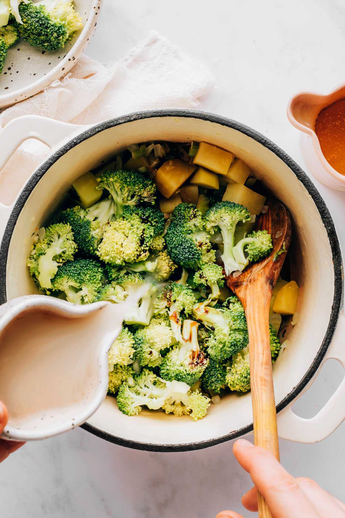 broccoli and potatoes in a pot