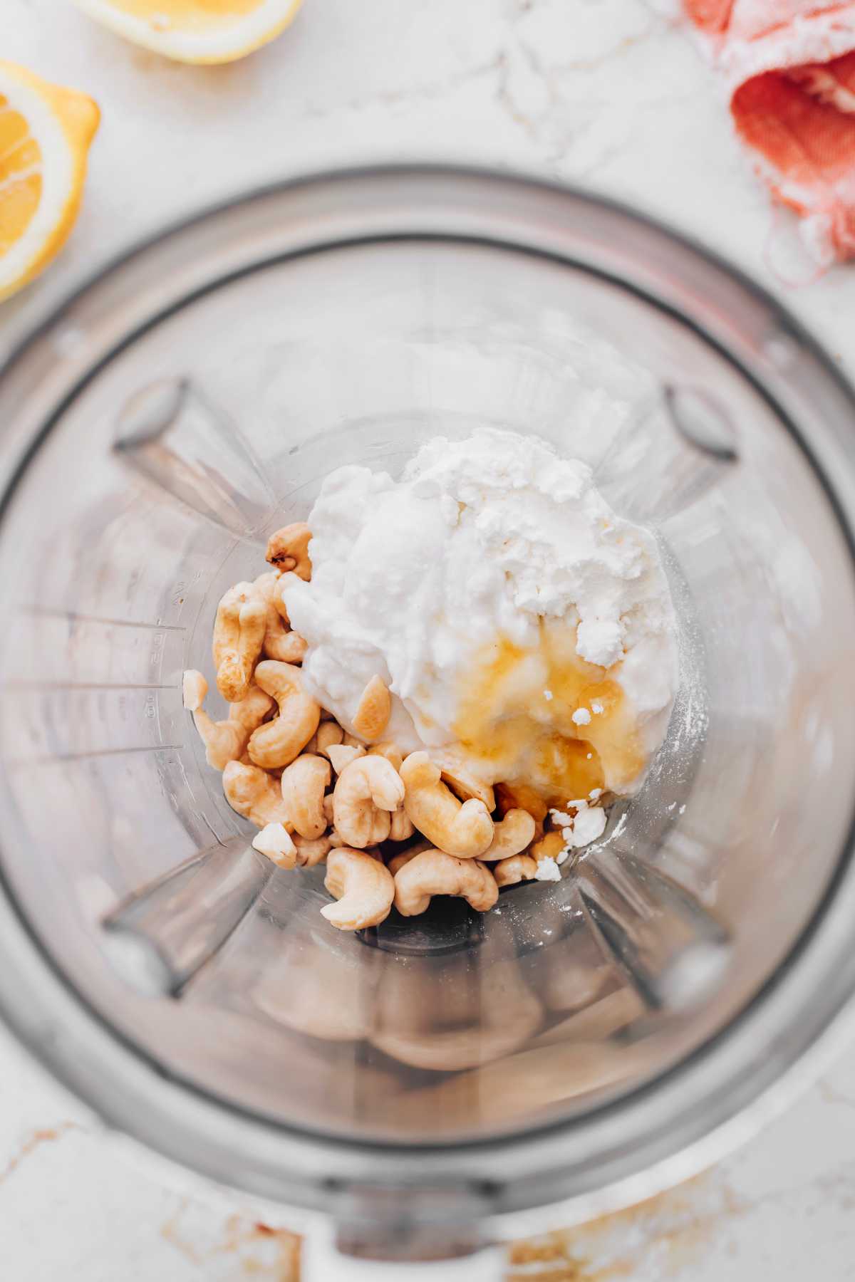 cashews, cream, and sugar in a blender