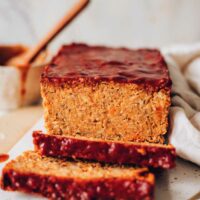 chopping board with freshly baked chickpea meatloaf