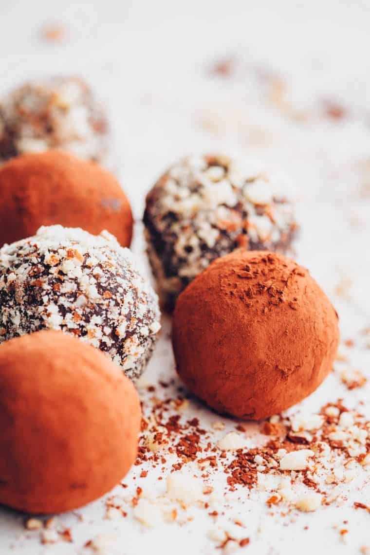 close up of half a dozen homemade almond and chocolate bliss balls
