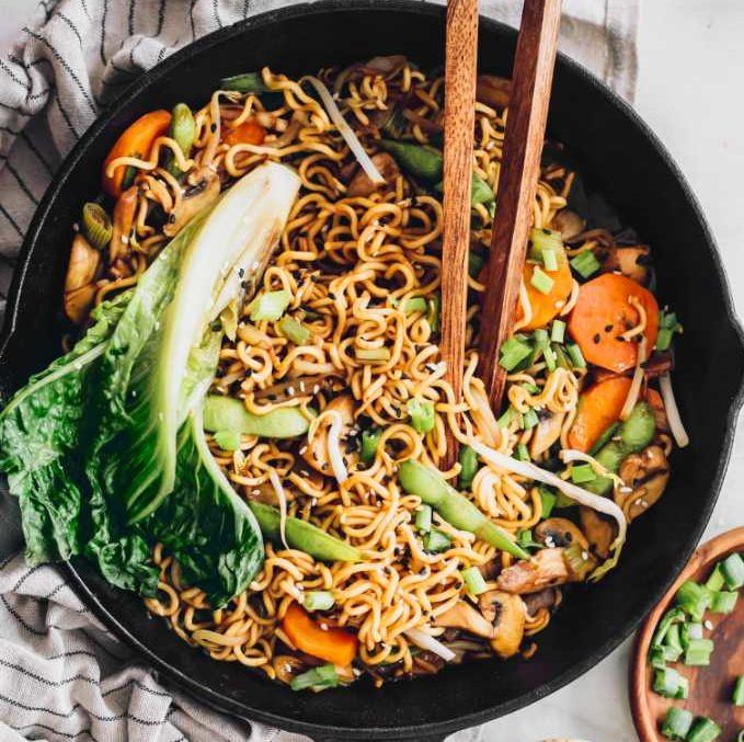 black pan with homemade vegan Chow Mein Noodles and chopsticks