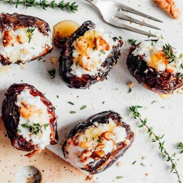 Cream Cheese Stuffed Dates next to a towl