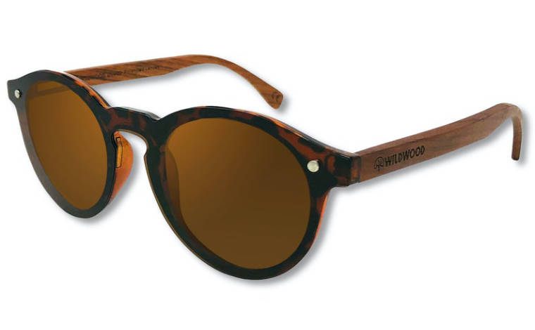 close up of a pair of eco friendly sunglasses with wooden arms and cat eye style