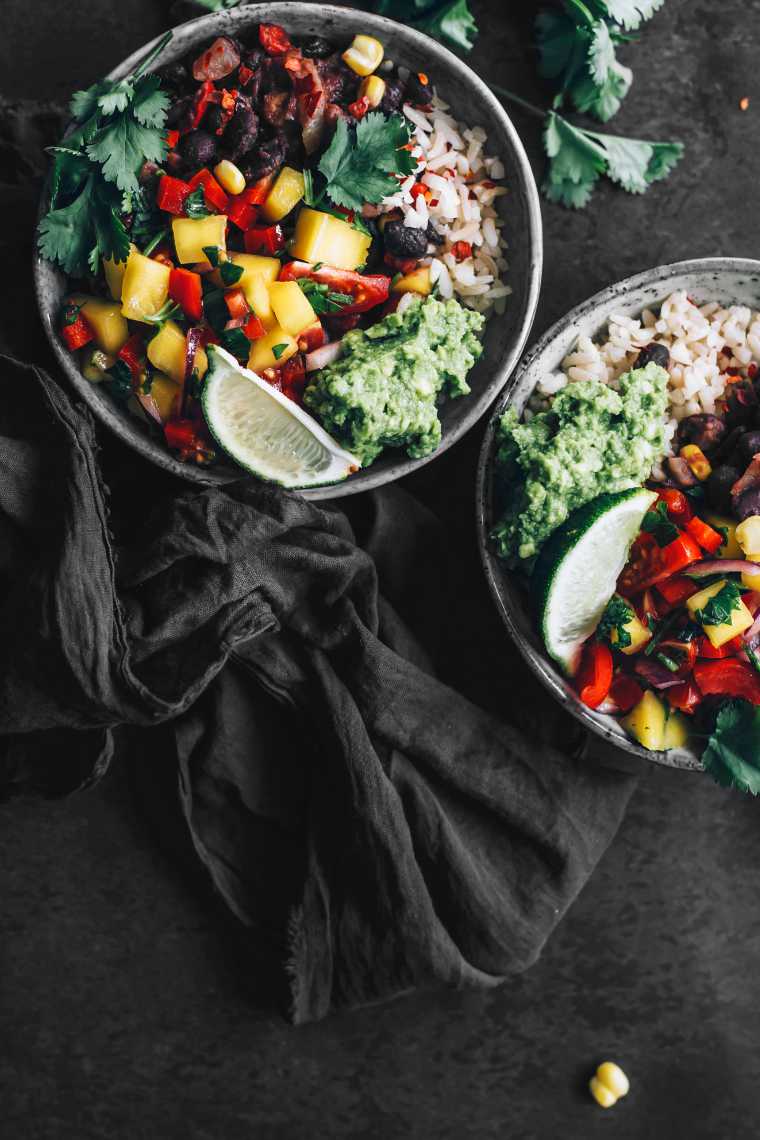 two vegan Mexican Buddha Bowls on a table