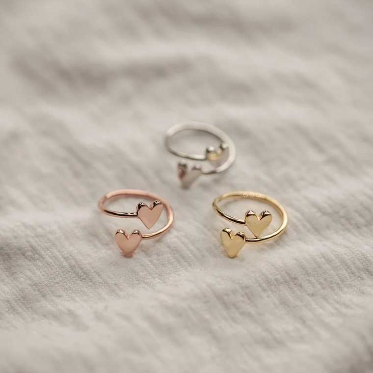 linen with three hand-made rings featuring two hearts each