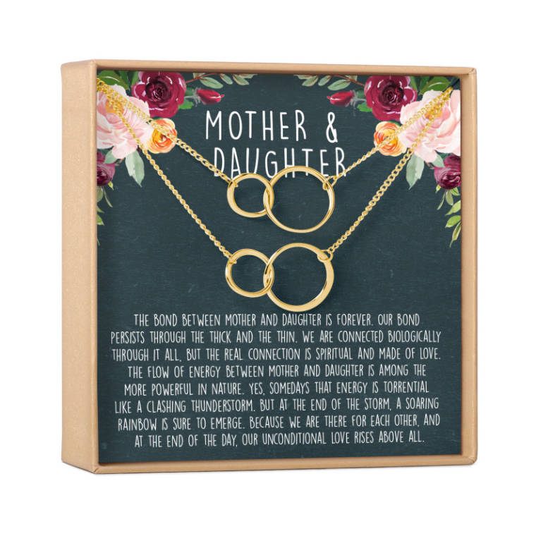 two golden necklaces with two intertwined rings each symbolizing the bond between mother and daughter