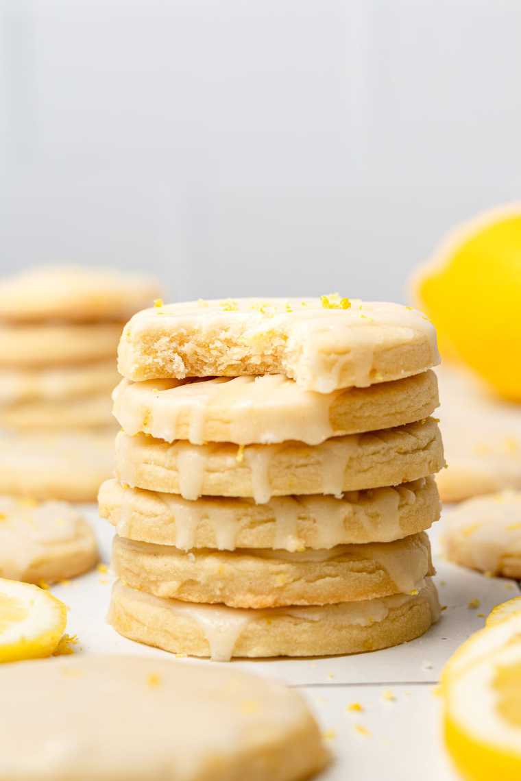 six vegan lemon cookies on top of each other on a table
