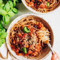 two bowls of pasta bolognese