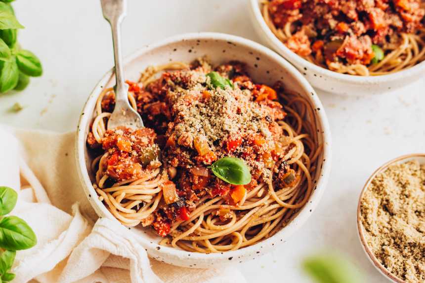 bowl of vegan bolognese over spaghetti