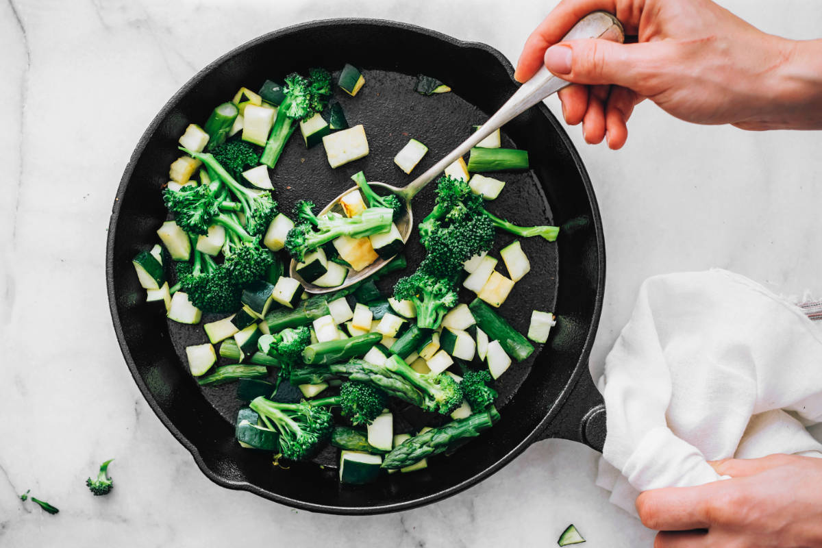 Sauteed green vegetables in a pan