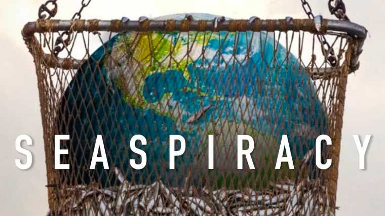Seaspiracy film image depicting fish as well as the planet earth globe in a large fishing net