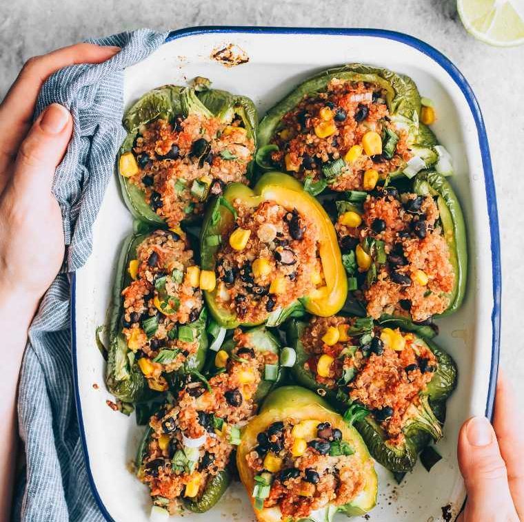 large baking dish with easy plant-based stuffed peppers