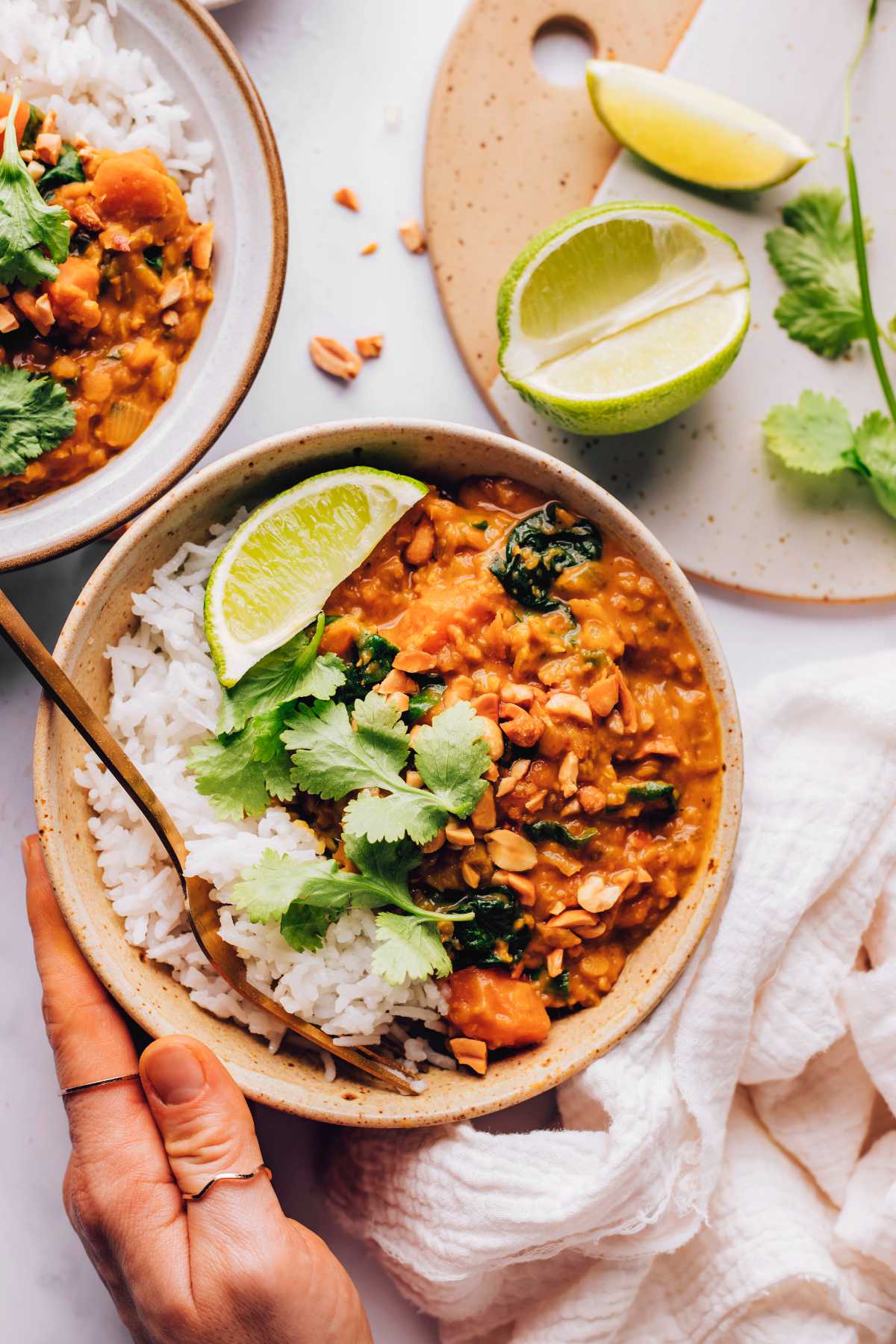 sweet potato lentil curry with rice in a bowl