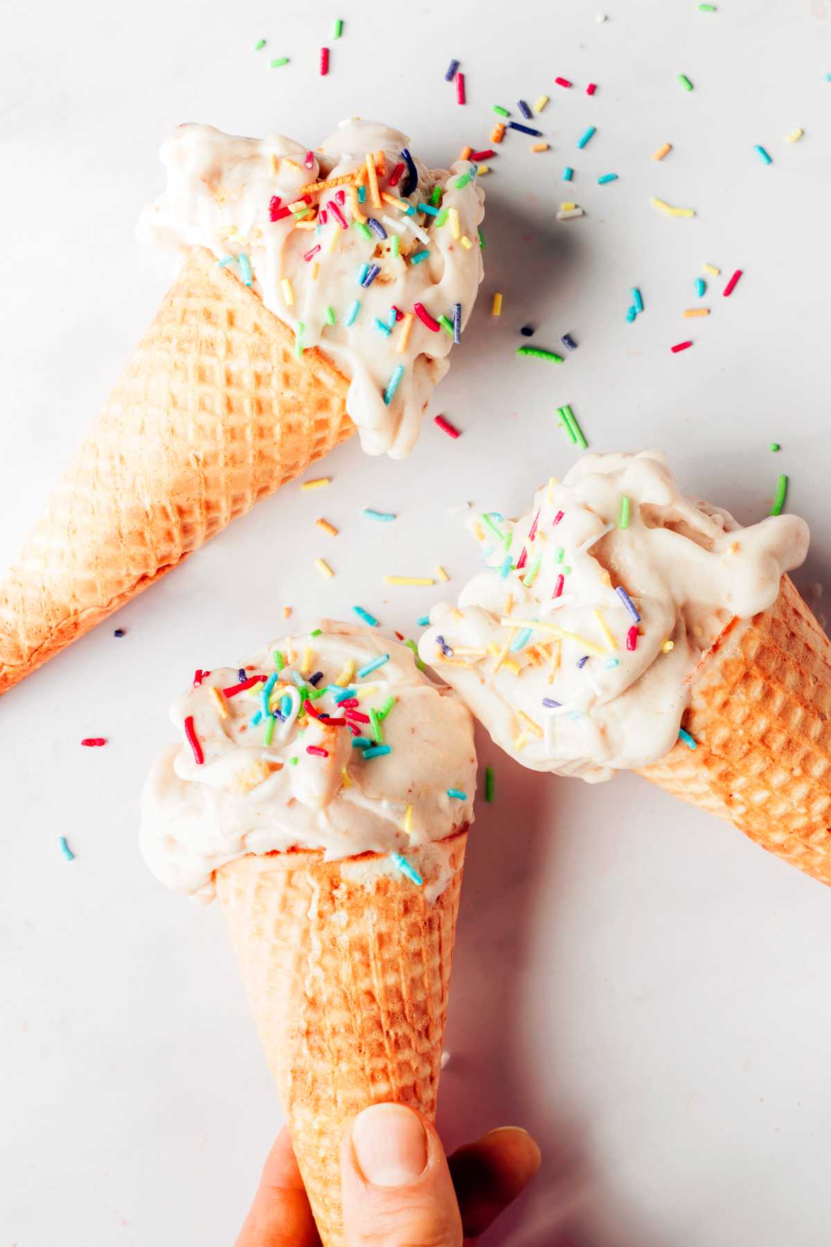 scoops of Birthday Cake NIce Cream in cones