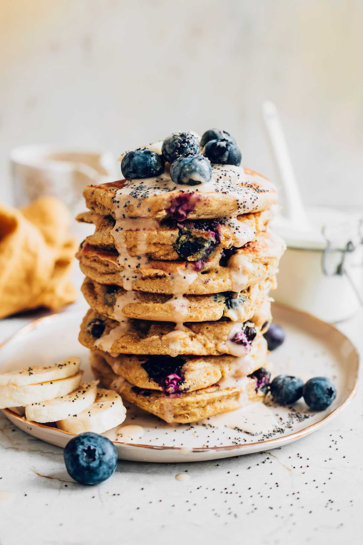 stack of vegan blueberry oatmeal pancakes
