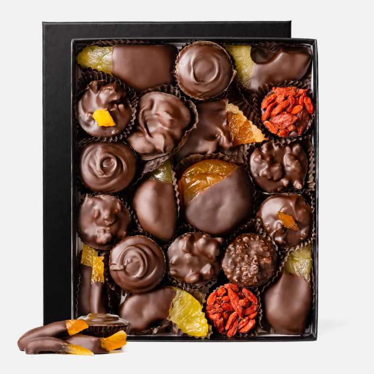 box of different vegan chocolates and chocolate-covered fruit