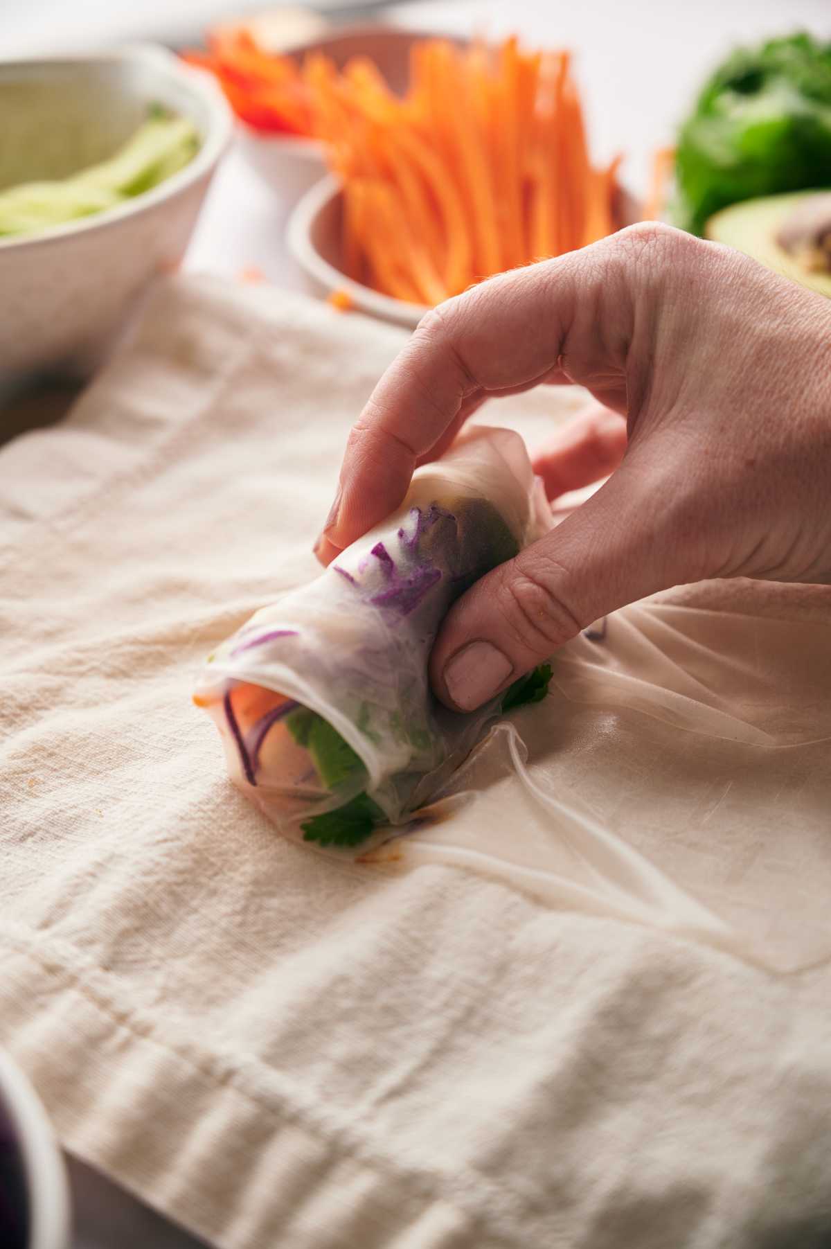 rolling filled rice paper sheet