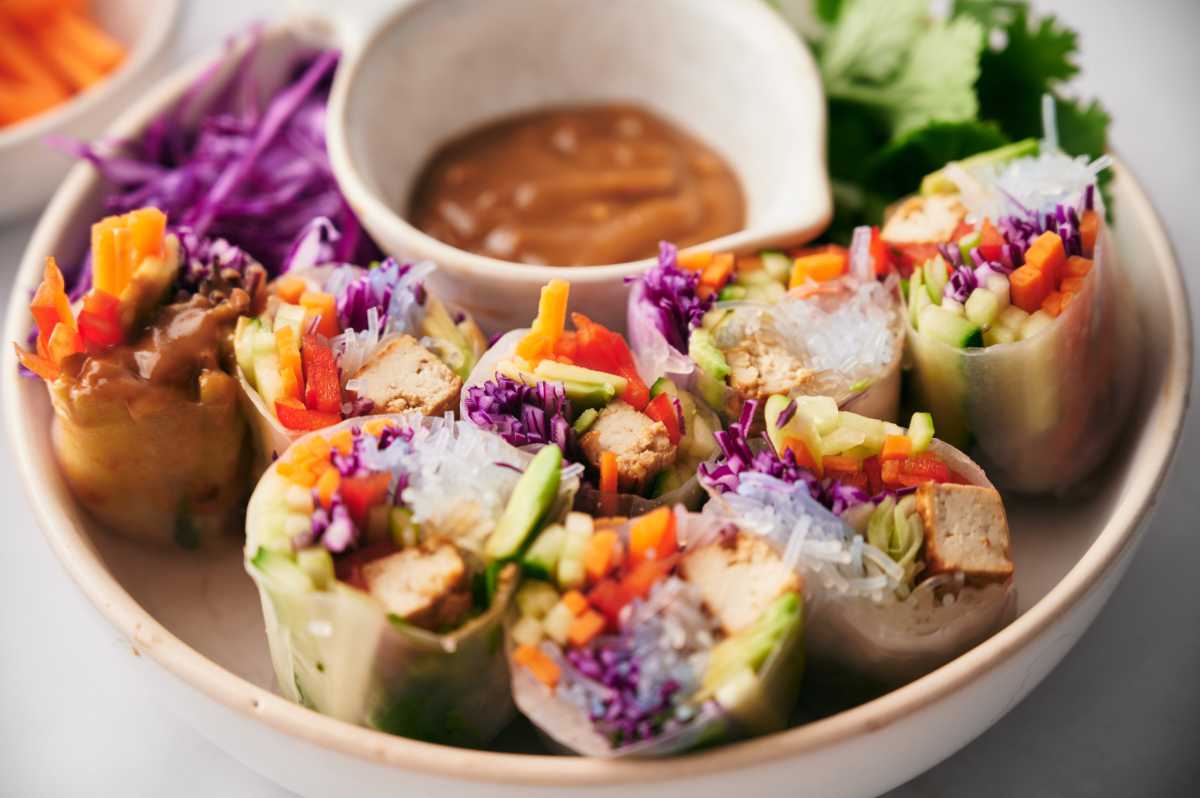 Vegan Tofu Summer Rolls with dipping sauce on a plate