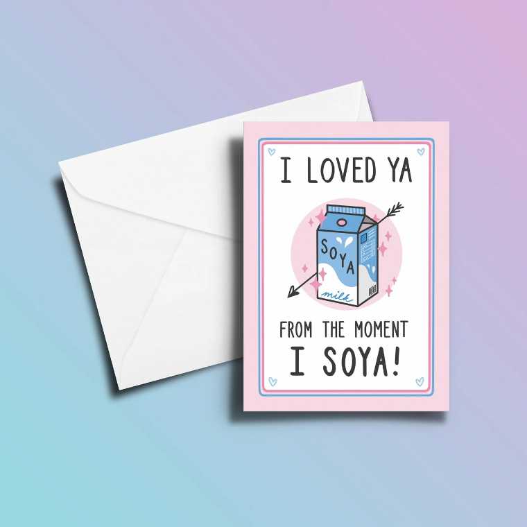 purple and blue background with a hand-made vegan Valentine's card saying "I loved you from the moment I soya!"