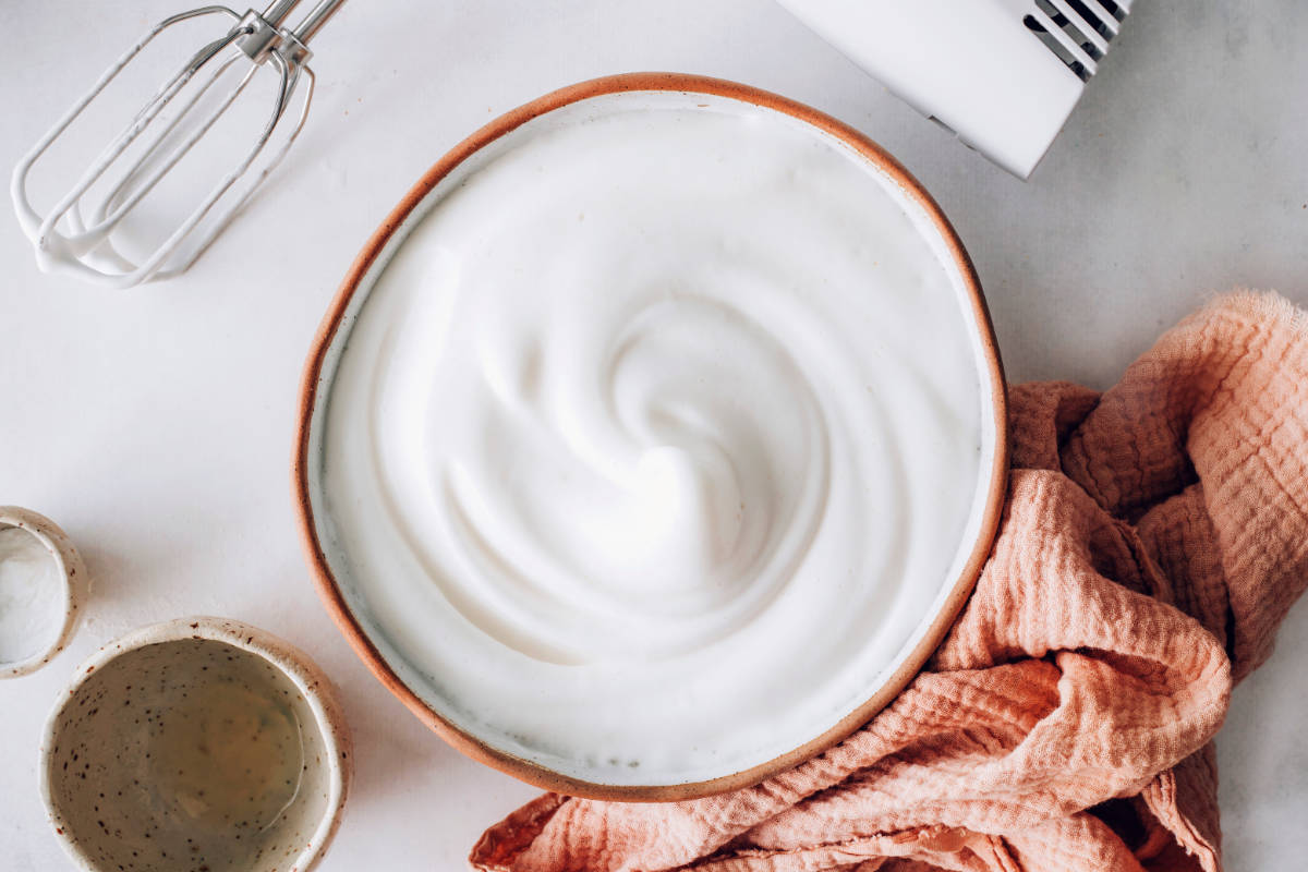 Vegan whipped cream in a bowl on a table