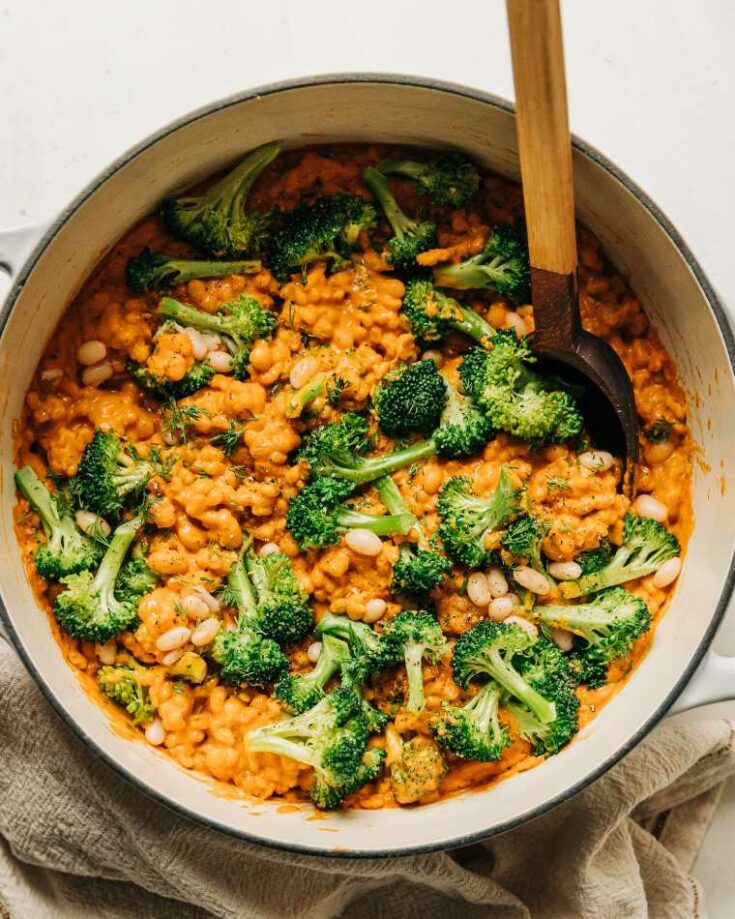 cheesy vegan broccoli and barley with white beans