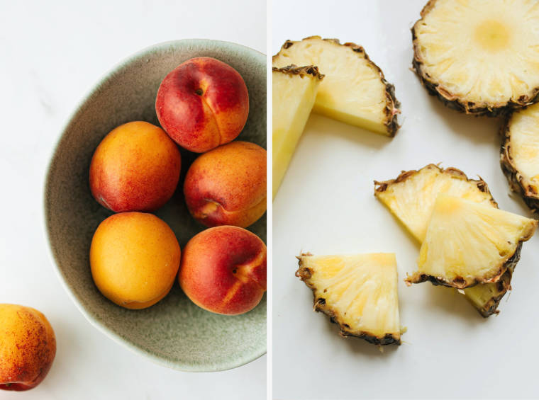 nectarines and pineapple on a table