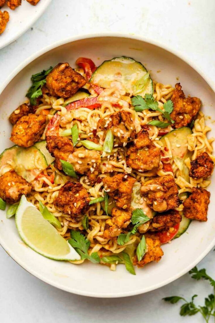 ramen peanut noodle salad with bell pepper and cucumbers with tempeh