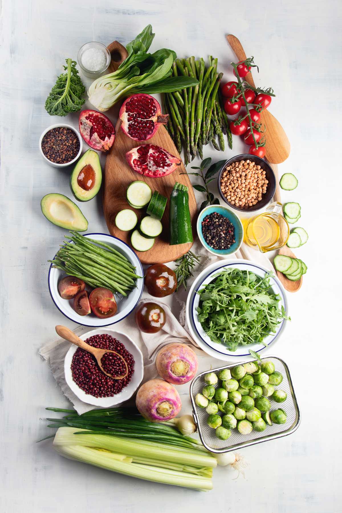 different vegetables, grains and legumes on a table